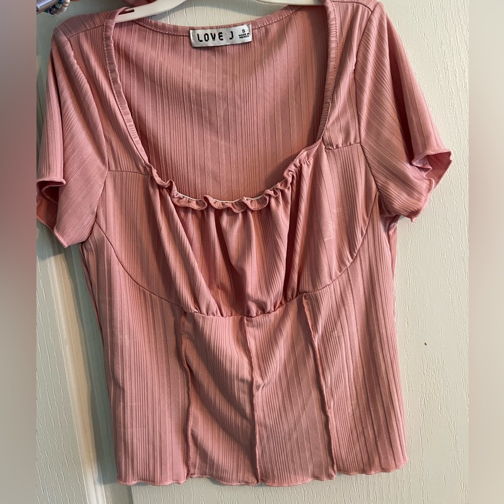 Small pink top.